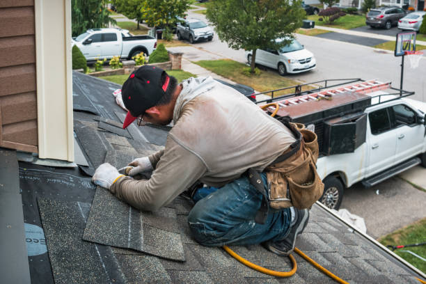 Professional Roofing technician working in Frankfort, MI